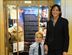 Heather Lamb stands in front of a memorial display honoring her wife, Maj. Adrianna Vorderbruggen, with the couples son, Jacob, Nov. 12, 2016, at the Air Force Academy. Vorderbruggen, a 2002 Academy graduate, was a U.S. Air Force Office of Special Investigations agent who died in Afghanistan last year. (U.S. Air Force photo/Tech. Sgt. Mike Slater) 