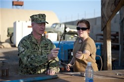 CAMP LEMONNIER, Djibouti (Dec. 9, 2011) - Master Chief Petty Officer of the Navy Rick D. West gets a hands-on look of the work Seabees do at Camp Lemonnier, Djibouti, from U.S. Navy Seaman Jennifer Ross, a Naval Mobile Construction Battalion 5 steelworker, December 9. West, the 12th MCPON, visited the camp to interact with Sailors and address the questions and issues affecting them. (U.S. Navy photo by Petty Officer 2nd Class Jeremy S. Brandt)