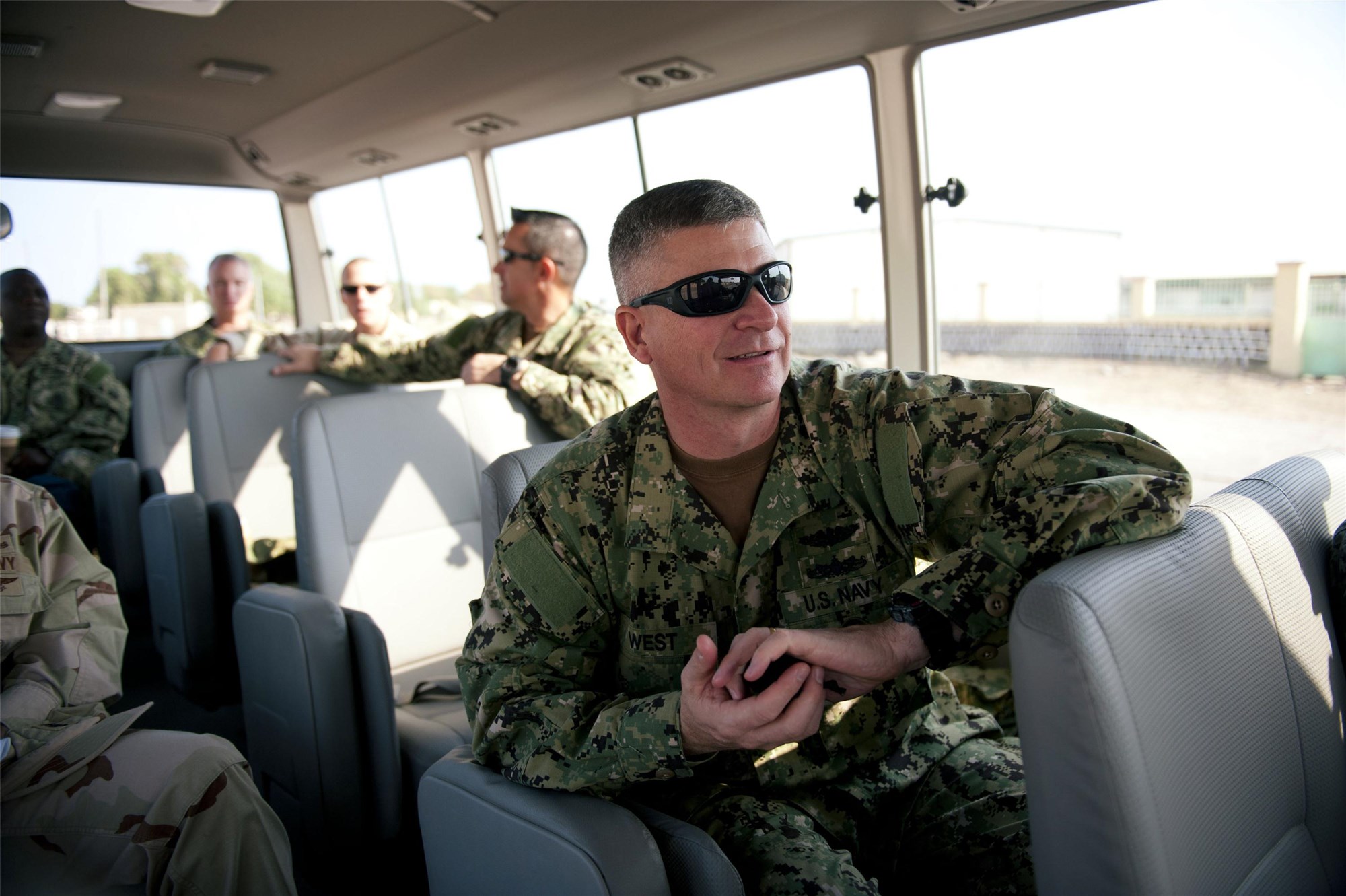 DJIBOUTI, Djibouti (Dec. 10, 2011) - Master Chief Petty Officer of the Navy Rick D. West gets a tour of the Port of Djibouti from U.S. Navy Maritime Expeditionary Security Squadron 4, December 10. West's tour was a part of his visit to Camp Lemonnier, Djibouti, to interact with Sailors and discuss current issues affecting them. MSRON 4 is home-ported at Norfolk Naval Shipyard in Portsmouth, Virginia. (U.S. Navy photo by Petty Officer 2nd Class Jeremy S. Brandt)