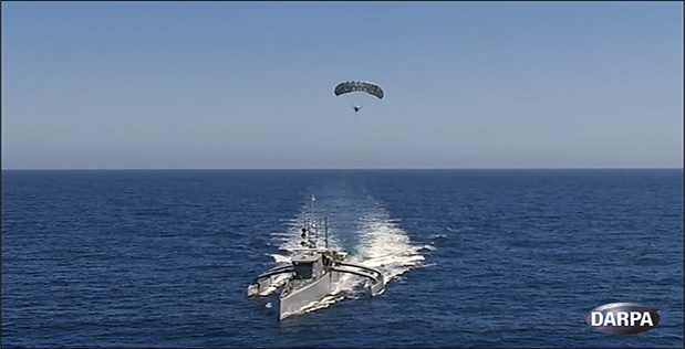 DARPA’s Anti-Submarine Warfare (ASW) Continuous Trail Unmanned Vessel (ACTUV) program has developed and built a technology demonstration vessel that is currently undergoing open-water testing off the coast of California and recently set sail with its first payload: a prototype of a low-cost, elevated sensor mast developed through the Agency’s Towed Airborne Lift of Naval Systems (TALONS) research effort.  