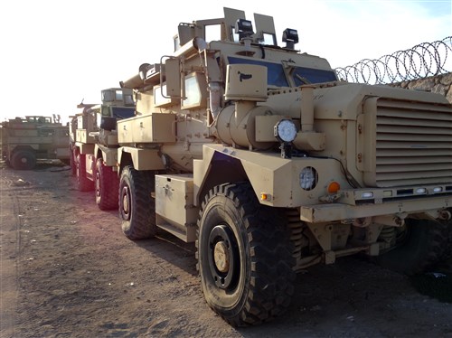 Four Mine-Resistant Ambushed Protective Vehicles that are part of the 20 vehicles that will be donated to Troop Contributing Countries Uganda and Burundi, wait to be turned over at the end of the month, Jan 13, 2014. (U.S. Army Courtesy Photo)