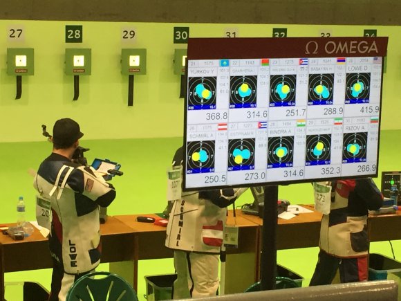 Spc. Dan Lowe, from the U.S. Army Marksmanship Unit, shoots his rifle during the Men's 10 meter Air Rifle competition, Aug 8, at the Deodoro Olympic Shooting facility, Rio 2016.