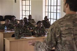 Uganda People’s Defense Force personnel attend an information operations course in Jinja, Uganda, recently. U.S. Army personnel from Combined Joint Task Force-Horn of Africa hosted the multi-week information operations course to help the UPDF develop their message planning and dissemination capabilities to counter Violent extremist organizations. (U.S. Air Force photo by Staff Sgt. Nathan Maysonet) 