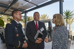 Vermont National Guard Bilateral Affairs Officer, Maj. Michael Smith (left), Deputy Adjutant General to the State of Vermont, Brig. Gen. Michael Heston (center), and U.S. Agency for International Development Mission Director for Senegal, Susan Fine (right), discuss the plans for the week after the opening ceremony of the Republic of Senegal Disaster Preparedness and Response Exercise in Dakar, Senegal, 2 June. The event represented a successful collaboration among international and interagency organizations, with the Government of Senegal hosting an event sponsored by U.S. Africa Command and executed by the Center for Disaster and Humanitarian Assistance Medicine. (U.S. Africa Command photo by Petty Officer First Class D. Keith Simmons)