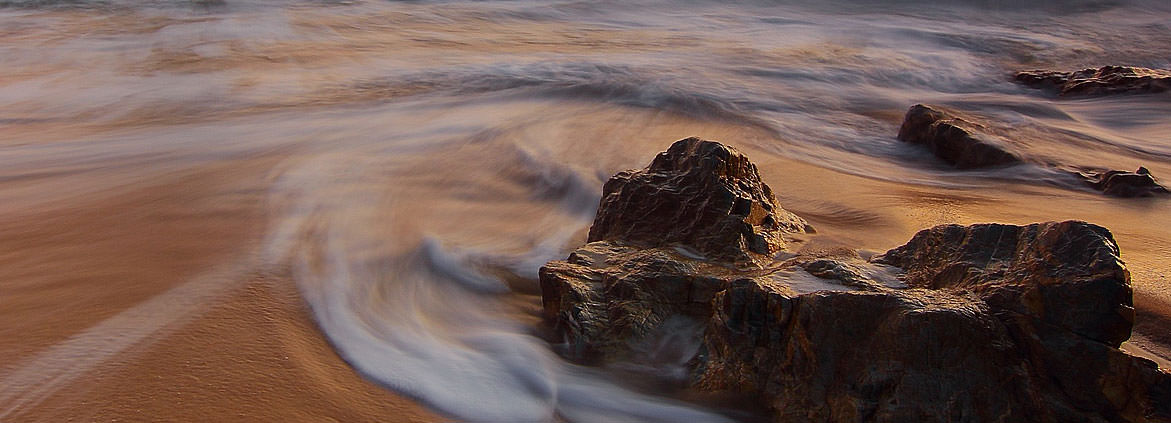 beach showing ocean tides