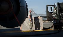 Airman 1st Class David Renzo, 92nd Logistics Readiness Squadron refueling equipment operator, monitors the fuel pressure gauges on his assigned hydrant truck as it fuels up a KC-135 Aug. 16, 2016, at Fairchild Air Force Base, Wash. Refueling actions on a dry KC-135 may take approximately an hour or longer depending on the demand for fuel at a given time. (U.S. Air Force photo/ Airman 1st Class Ryan Lackey)
