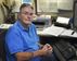 Chuck McBay, 53rd Wing facility manager, poses for a photo in his workspace Dec. 17, 2015, at Eglin Air Force Base, Fla. McBay will retire after 52 years of both active-duty and civil service. (U.S. Air Force photo by 1st Lt. Amanda Farr)
