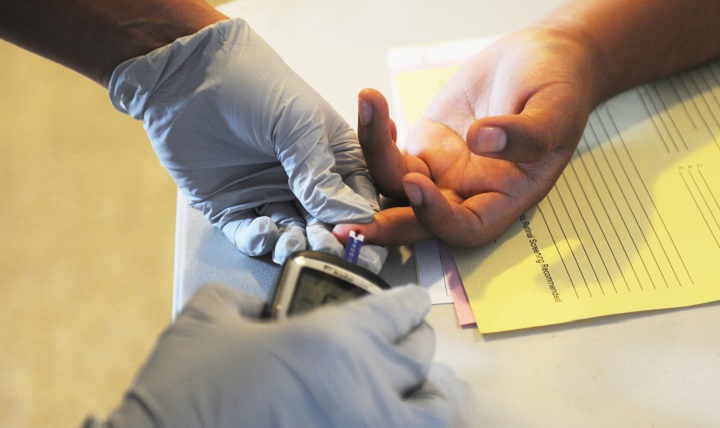 A Soldier performs a glucose screening. A person diagnosed with diabetes is lacking insulin or is insulin resistant so that the body can’t process sugars normally. (U.S. Army photo by Sgt. Jessica A DuVernay)