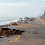 <p>Flagler, FL, USA-- Damage to roadway in Flaglar County following Hurricane Matthew. FEMA, state and local officials continue damage assessments along Florida eastern coast.</p>