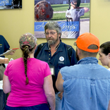 <p>FEMA employee answers questions during town hall meeting in Ascension Parish on Saturday, August 20, 2016. (Photo by J.T. Blatty/FEMA)</p>