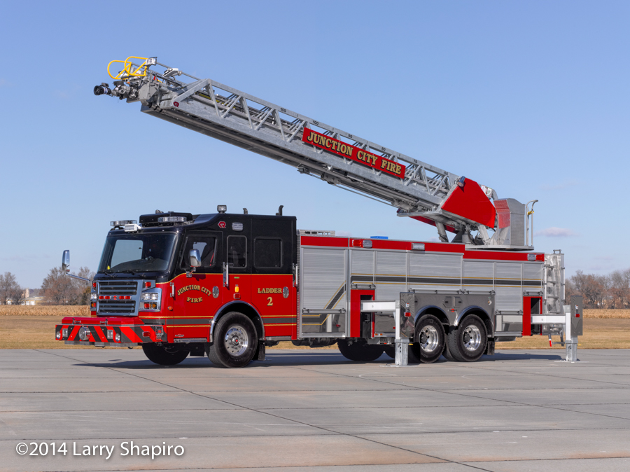 Image of red fire truck with ladder.