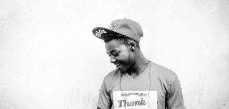 Smiling african american teenager wearing a shirt that says thank you