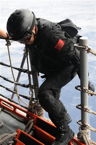 USS STEPHEN W. GROVES, At Sea (June 7, 2011) -- Members of Royal Morocco armed forces maritime interdiction operations team attached to the Royal Morocco navy ship Hassan II board USS Stephen W. Groves (FFG 29), serving as a vessel suspected of illicit trafficking, June 7 as a part of Phoenix Express 2011 (PE-11). A three-week evolution divided into two phases of training, PE-11 is designed to enhance regional maritime partnerships among the 13 participating nations in their efforts to deter illicit trafficking at sea. 