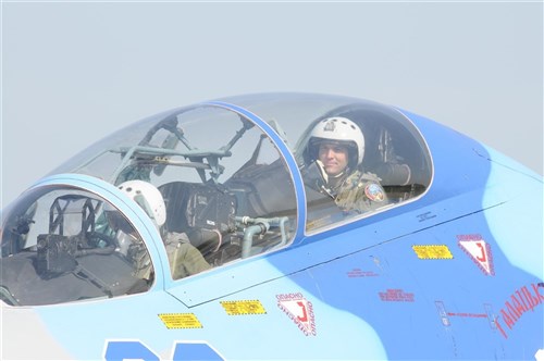 Capt. Frank Prokop, an F-16 pilot from the Alabama Air National Guard sits in the back seat of a Ukrainian SU-27 before his orientation ride on July 19, 2011 with Ukraine Col. Oleh Ges flying in the front seat during exercise SAFE SKIES 2011.  SAFE SKIES 2011 is a joint Ukraine, Poland, U.S. aerial exchange event. (U.S. Air Force photo by Tech. Sgt. Charles Vaughn, 144 FW/PA)