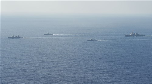 MEDITERRANEAN SEA (Aug. 12, 2013) -  The guided missile destroyer USS Gravely (DDG 107) maneuvers with Israeli navy vessels during Exercise Reliant Mermaid. Gravely, homeported in Norfolk, Va., is on a scheduled deployment supporting maritime security operations and theater security cooperation efforts in the 6th Fleet area of responsibility.