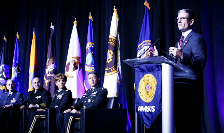 Rep. Joe Heck (right) of Nevada, member of the House Armed Services Committee, addressed those attending the AMSUS (The Society of Federal Health Professionals) 2016 meeting at National Harbor near Washington, D.C.