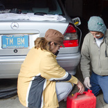 Image cover photo: Siphoning Gasoline to use in Generator