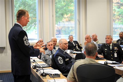 Command Chief Master Sgt. Todd Small, enlisted advisor to NATO Supreme Allied Commander Europe, addresses an assembled group of senior enlisted leaders, from more than 30 nations, at the opening of the 10th annual International Senior Enlisted Seminar, Sept. 9, 2013. ISES participants focus on building the capabilities and interoperability of noncommissioned officers, while continuing to develop the NCO corps of NATO, Partnership for Peace, and key-contact nations.