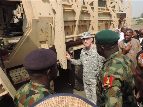 U.S. donates 24 Armored Personnel Carriers to Nigeria: U.S. Defense Attaché to Nigeria, Colonel Patrick Doyle, (middle), with senior Nigerian army officers during the hand-over ceremony of  24 Mine-Resistant Armor-Protected (MRAP) vehicles to Nigeria’s military authorities in Lagos, Jan. 7, 2016. (Photo Credit: U.S. Consulate General Lagos)          