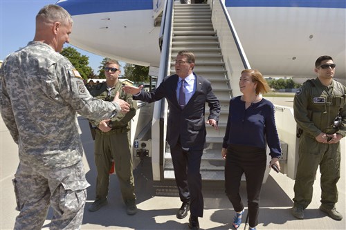 U.S. Army Gen. David M. Rodriguez, commander of U.S. Africa Command, greets U.S. Defense Secretary Ash Carter, left, and his wife, Stephanie, as they arrive in Stuttgart, Germany, June 4, 2015, where Carter hosted a troop talk with U.S. service members. Carter is wrapping up a trip that also took him to the Asia-Pacific region where he met with allies and partners to advance the next phase of the rebalance. DoD photo by Glenn Fawcett 