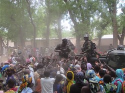 Cameroon Soldiers assigned to the Battalion d'Intervention Rapide arrive at a humanitarian assistance site in Kourgui, Cameroon May 13, 2015. The mission, led by Cameroonian Soldiers and funded through the U.S. Africa Command Humanitarian and Civic Assistance Program, provided medical assistance and education to more than 1,250 people displaced due to Boko Haram violence.