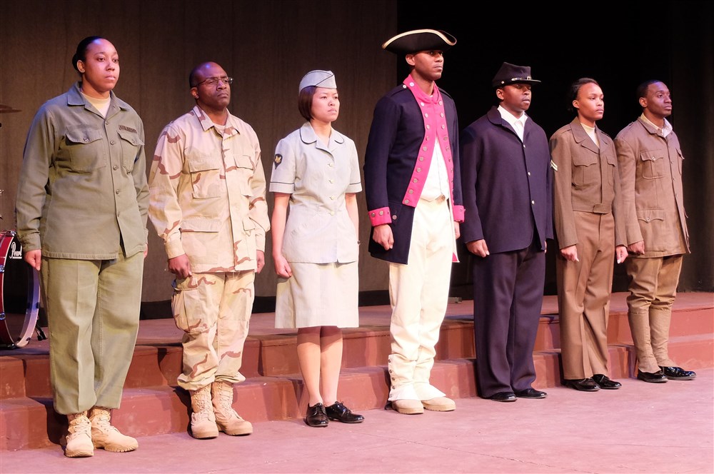 African Americans through military history. "A Century of Black Life, History and Culture” served as the theme for this year’s Black History Month celebration, held at Kelley Barracks, U.S. Army Garrison Stuttgart, Feb. 26, 2015.  Performances by the Patch High School and Stuttgart Gospel Service Choirs and a dance from the play “Her Stories” highlighted the accomplishments of African Americans over the past century. (U.S. Africa Command photos by Brenda Law/Released)  