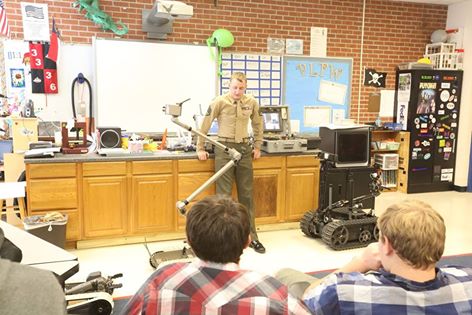 'Staff Sgt. Daniel L. Lohmann teaches a class about the robots that Marines use during a robotics demonstration at Swansboro High School in Swansboro, N.C., Nov. 17, 2016. Explosive ordnance disposal technician Marines gave demonstrations to the Swansboro High School Robotics Team to give them ideas for their upcoming competition while strengthening the community relationship. Lohmann is a team leader with Explosive Ordnance Disposal Company, 2nd Marine Logistics Group, at Camp Lejeune, N.C. (U.S. Marine Corps photo by Sgt. Clemente C. Garcia)'