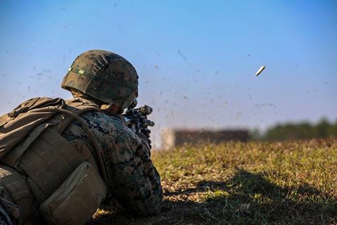 'Lance Cpl. William Finn fires an M4 Carbine rifle during a training exercise at Camp Lejeune, N.C., Nov 16, 2016. The Marines practiced squad-sized movements in order to maintain unit readiness for their upcoming Integrated Training Exercise at the Marine Corps Air Ground Combat Training Center in Twentynine Palms, California. Finn is a grenadier with 1st Battalion, 8th Marine Regiment. (U.S. Marine Corps Photo by Lance Cpl. Jon Sosner)'