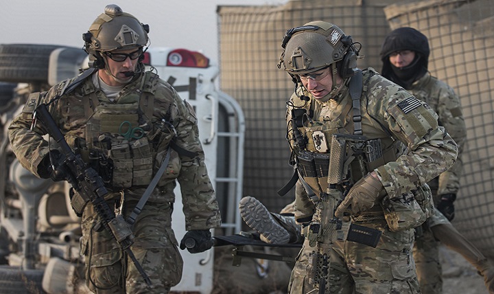 “Guardian Angels” of the 83rd Expeditionary Rescue Squadron carry a patient by litter for evacuation during a mass casualty exercise at Bagram Airfield, Afghanistan. Training scenarios are based on real-world situations that have been encountered in past operations. (U.S. Air Force photo by Staff Sgt. Katherine Spessa)