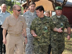 ZADAR, Croatia &mdash; Navy Adm. James G. Stavridis, U.S. European Command commander, walks with Brig. Gen. Drazen Scuri, Col. Nikola Zupanic, and Maj. Gen Frank Kisner after arriving at Zemunik Air Base here Sept. 23, 2009. The EUCOM commander came here to visit the site of the special operations exercise, Jackal Stone. The international special operations exercise, co-organized by the Special Operations Battalion of General Staff of the Croatian Armed Forces and U.S. Special Operations Command Europe, is being conducted to enhance the capabilities and interoperability of the soldiers participating. (Department of Defense photo by Maj. Jim Gregory)
