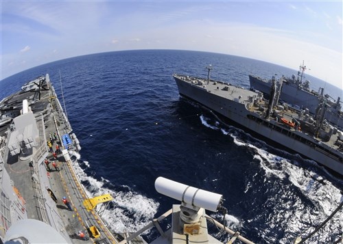 MEDITERRANEAN SEA (Mar. 10, 2011) USS Kearsarge (LHD 3), left, and USS Ponce (LPD 15), right, are alongside USNS Kanawha (T-AO 196)  during a replenishment at sea. Kearsarge is the command ship of Kearsarge Amphibious Ready Group, supporting maritime security operations and theater security cooperation efforts in the U.S. 6th Fleet area of responsibility. (U.S. Navy photo by Mass Communication Specialist 3rd Class Scott Pittman/Released)