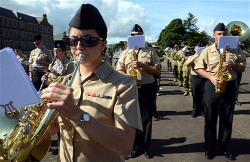 Musician Seaman Alexis Thompson, left, and Musician 3rd Class Jeffrey Jones, right, play French horns in the U.S. Naval Forces Europe Band during a rehearsal for the massed military band portion of the Royal Edinburgh Military Tattoo.