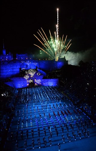 Fireworks shoot off from the castle and diamonds are projected onto the castle walls as multinational musicians and performers play "Diamonds are Forever" in honor of Her Majesty Queen Elizabeth II's Diamond Jubilee year during a Royal Edinburgh Military Tattoo dress rehearsal for charities and local citizens of Edinburgh. This military tattoo brings together musicians, dancers and bagpipers from around the world to perform in Europe’s most prestigious military tattoo and this year marks the first time since 1950 that a Navy band has performed in the show.
