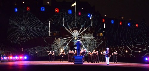 U.S. Naval Forces Europe Band musicians play the theme to “Spider-man” during the second official show night for the Royal Edinburgh Military Tattoo Aug. 4. The month long tattoo brings together musicians, dancers and bagpipers from around the world to perform in Europe’s most prestigious military tattoo.