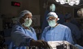 Medical personnel conduct a procedure at the Eisenhower Army Medical Center operating room. Eisenhower AMC was recognized by the American College of Surgeons National Surgical Quality Improvement Program for its surgical safety and quality of care for the second year in a row. (U.S. Army photo by John Corley)