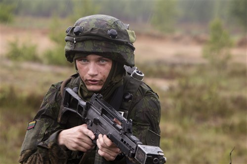 Ready to fight to protect; 13 NATO Allies come together for Exercise Saber Strike 16, Latvia. (U.S. Marine Corps photo by Cpl. Kelly L. Street, 2D MARDIV COMCAM/Released)

A Lithuanian soldier looks up as she prepares to move positions during Exercise Saber Strike 16 aboard Adazi Military Base, Latvia, June 17, 2016. U.S. and NATO Allies participate in this theater security cooperation exercise to prepare participants for worldwide contingency operations. (U.S. Marine Corps photo by Cpl. Kelly L. Street, 2D MARDIV COMCAM/Released)