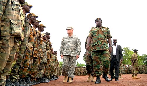 FREETOWN, Sierra Leone - Major General David R. Hogg (center), commander of U.S. Army Africa and Lieutenant Colonel A.B. Conteh, AMISOM battalion commander, Republic of Sierra Leone Armed Forces (RSLAF), inspect Sierra Leone troops during a deployment ceremony May 20, 2012. Nearly 1,000 RSLAF personnel completed training for an upcoming African Union Mission in Somalia (AMISOM) deployment. (U.S. Army Africa photo)  