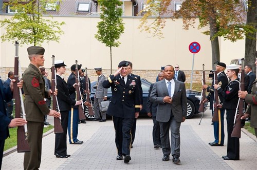 STUTTGART, Germany - Sao Tome and Principe Prime Minister Patrice Emery Trovoada, left, and General Carter F. Ham, commander of U.S. Africa Command, walk through the honor guard cordon marking the prime minister's arrival at command headquarters at Kelley Barracks on Monday, September 24, 2012. The prime minister, the first African head of state to visit AFRICOM's headquarters, spent the day engaging with senior leaders on mutual security cooperation issues. (U.S. AFRICOM photo by Martin Greeson)