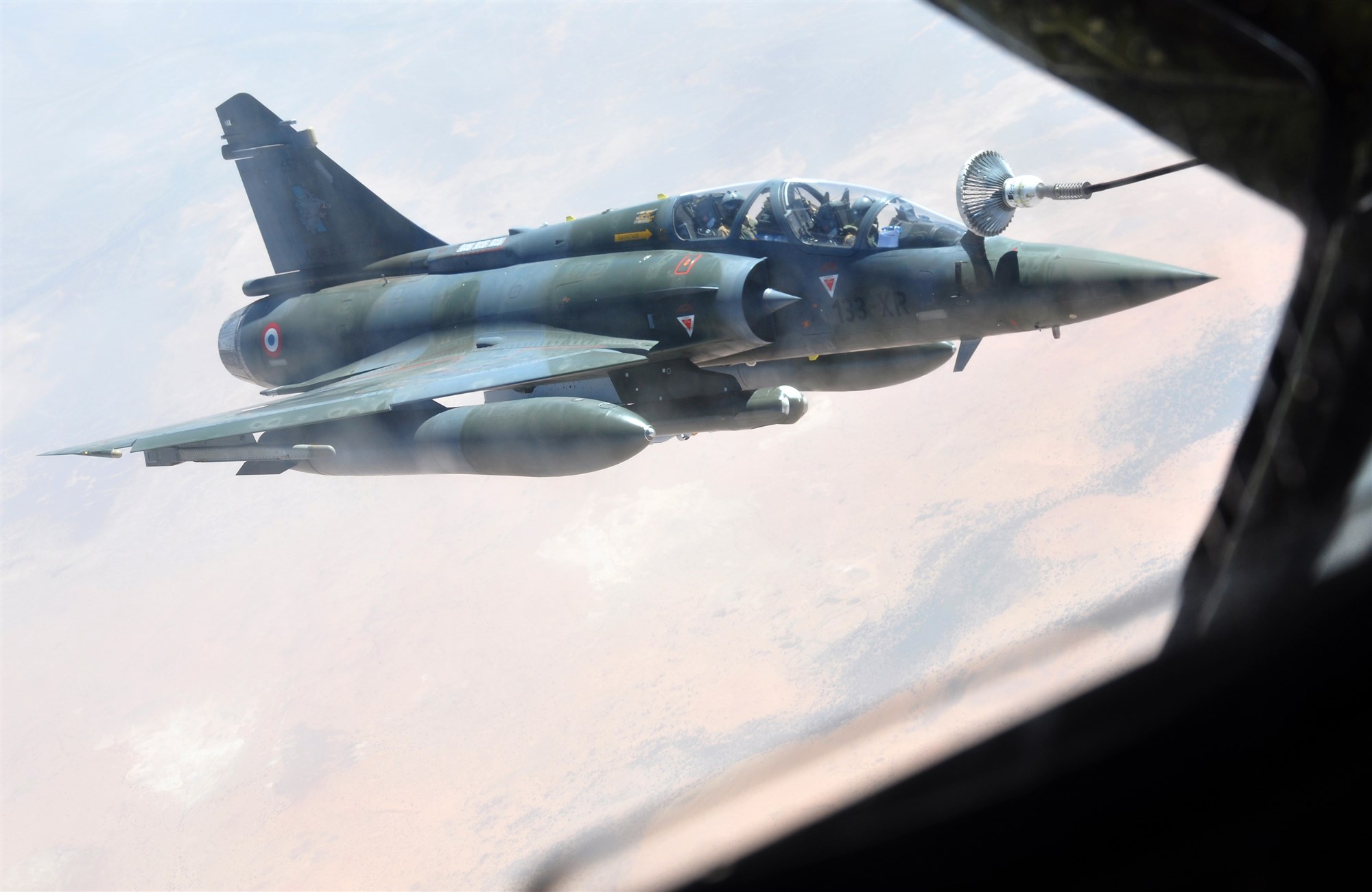 A French Mirage fighter refuels from a U.S. Air Force KC-135 Stratotanker from the 100th Air Refueling Wing, RAF Mildenhall, England, over Africa Jan. 30, 2013. Tankers from RAF Mildenhall, operating from a forward-deployed location, began flying refueling missions in support of French operations in Mali Jan. 27, 2013. (U.S. Air Force photo by Capt. Jason Smith)