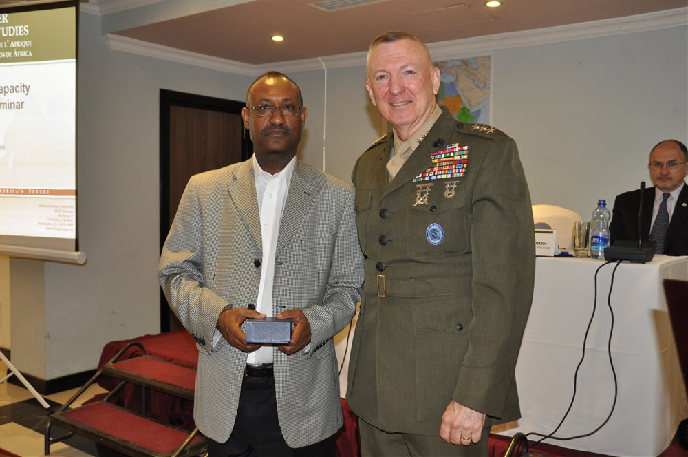 US Marine Corps Lt. Gen. Steven Hummer, Deputy to the Commander, US Africa Command, presents gift to Brig. Gen. David Baburam, Director of Mission Support Unit, Peace Support Operations Division, African Union, at the Africa Logistics Capacity Development Seminar, Addis Ababa, Ethiopia, April 27, 2014.
