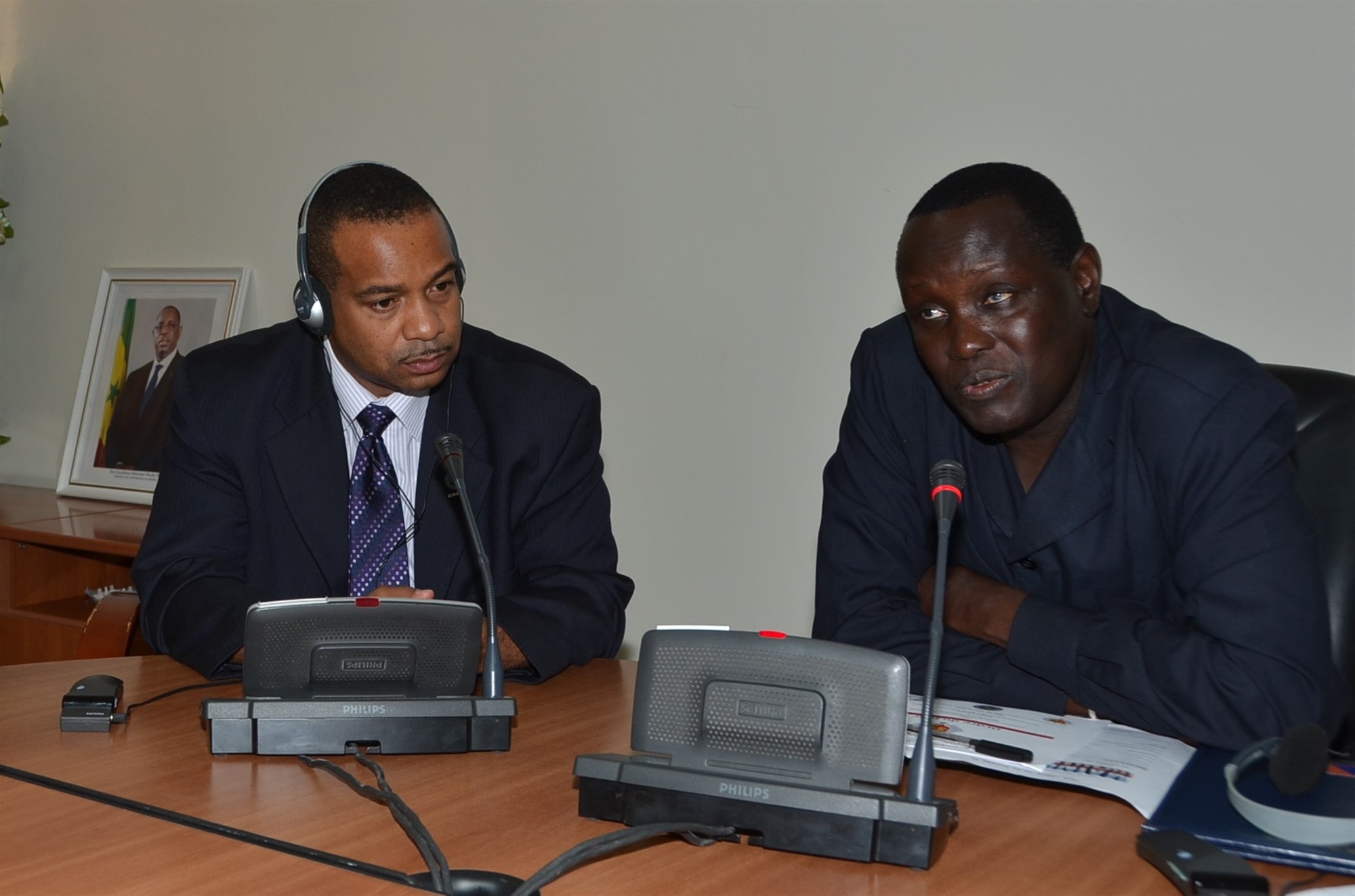 DAKAR, Senegal — Dame Gaye, Administrateur Civil et Directeur de la Protection Civile, addresses the participants of the Disaster Preparedness Program facilitated-planning discussion upon conclusion of a meetings to develop the National Civilian Pandemic Contingency Response Plan and Military Support to Civil Authorities Plan for all-hazards, as USAFRICOM Program Manager, Erik Threet, listens closely before discussing the way ahead and plans for future engagements with Senegal. (Courtesy photo by Protection Civile du Senegal)