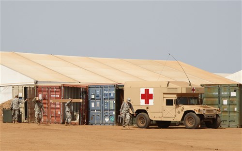 Soldiers of the 49th Medical Battalion unpack supplies from shipping containers while setting up their clinic in Senegal, Africa June 13. Consisting of the 912th Forward Surgical Team from Cranston, Rhode Island and the 335th Area Support Medical Company from Puerto Rico, the 49th MB deployed in support of Exercise Western Accord, a U.S. Africa Command-sponsored joint annual training event hosted by U.S. Army Africa and a joint training mission between the U.S., the Economic Community of West African States and partner nations.