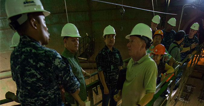 150915‐N‐GI544‐148 PEARL HARBOR (Sept. 15, 2015) Capt. Ken Epps, commanding officer of NAVSUP Fleet Logistics Center Pearl Harbor, left, briefs members of the Honolulu Board of Water Supply, Moanalua Valley Community Association and Pearl City Neighborhood Board No. 21 during a visit to one of the empty fuel tanks at the Red Hill Underground Fuel Storage Facility near Pearl Harbor. The group visited the modernized Red Hill Bulk Fuel Storage Facility, where subject matter experts showed how the Navy maintains the facility as a national strategic asset. Red Hill provides fuel to operate overseas while ensuring drinking water in the area remains safe. (U.S. Navy photo by Mass Communication Specialist 2nd Class Laurie Dexter/Released)