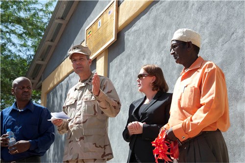 DIRE DAWA, Ethiopia (May 22, 2012) - U.S. Navy Rear Admiral Michael Franken, Combined Joint Task Force - Horn of Africa commander, speaks during a school dedication ceremony along with Molly Phee, deputy chief of mission, U.S. Embassy in Ethiopia, and Egei Wabere (right), Gende Gerada Kebele education coordinator, at the Gende Gerada Primary School. Ethiopian and U.S. personnel gathered for a school building dedication and ribbon cutting ceremony for a new school house and two latrines at the school here May 22. (U.S. Air Force photo by Tech. Sgt. Ryan Labadens)