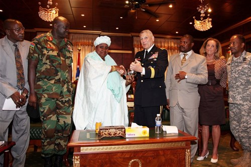 BANJUL, The Gambia - Dr. Istao Njie-Saidy, Gambian vice president, greets General Carter Ham, commander of U.S. Africa Command, upon his arrival in Banjul, The Gambia, July 21, 2011. Ham provided closing remarks for Exercise Africa Endeavor 2011, the annual U.S. Africa Command-sponsored, multilateral communications exercise, focusing on both technical and human interoperability and information exchange. This year, 35 African nations, five European countries, the United States, and four international organizations participated. (Photo by AE photographer Susannah Dowell)