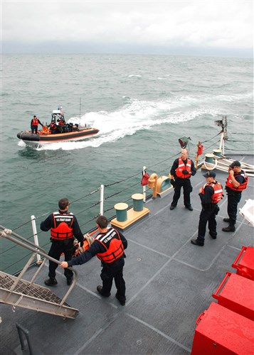 USCGC LEGARE, At sea - Crewmembers onboard U.S. Coast Guard Cutter Legare (WMEC 912) make final preparations, August 18, 2009,  before boarding Yu Feng, a Taiwanese-flagged fishing vessel found illegally fishing off the coast of Freetown, Sierra Leone.  Legare, homeported in Portsmouth, Virginia, is currently on a three-month deployment as part of Africa Partnership Station (APS).  APS is an international maritime safety and security initiative led by Commander, U.S. Naval Forces Europe-Africa/Commander, U.S. 6th Fleet. (U.S. Coast Guard photo by Petty Officer 2nd Class Shawn Eggert)