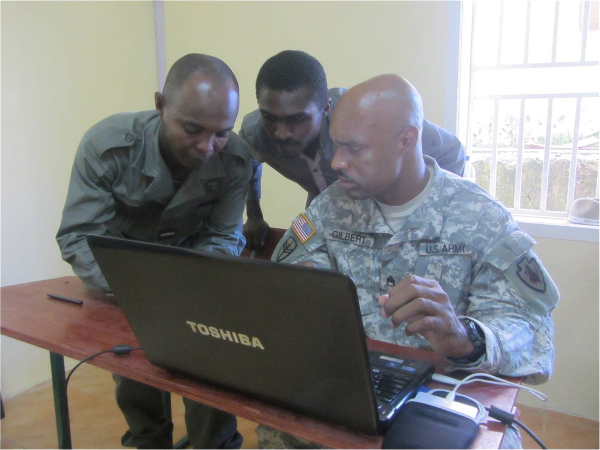 MORONI, Comoros - U.S. Army Staff Sgt. David Gilbert, squad leader, 3rd Squadron, 124th Cavalry Regiment, Texas National Guard 3rd Squadron, 124th Cavalry Regiment, Texas National Guard assigned to the Combined Joint Task Force - Horn of Africa, discusses self-development methods with Comorian Army of National Development noncommissioned officers during a five-day Noncommissioned Officer Development Seminar at the National School of Army and Gendarmerie held June 12-16. Noncommissioned officers from the U.S. and Comorian armies partnered together to share best practices of basic NCO skills. (Comoros Army photo by 1st Lt. Said Yasser)