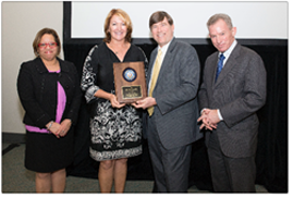 Mr. Robert Foster, Department of the Navy Chief Information Officer (DON CIO); Ms. Janice Haith, Director, DON Deputy CIO (Navy); and Mr. Kenneth Bible, Deputy Director, HQMC C4, U.S. Marine Corps, presented the Privacy Program Excellence Award to Ms. Kosaka during the awards ceremony at the DON IT West Coast Conference on February 17, 2016.