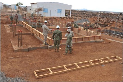 Ali Oune, Djibouti (April 5, 2012) - SeaBees (MCB3, Camp Lemonnier) lay the foundation for the Consultative Health Clinic in Ali Oune, Djibouti.  The U.S. Navy Mobile Construction Battallion 3 from Camp Lemonnier is constructing the Consultative Health Clinic that will provide maternity services as well as living quarters for duty nurses. The project is currently at 18 percent completion with a projected hand over date of October 2013. (U.S. Air Force photo by Technical Sergeant James Brock)