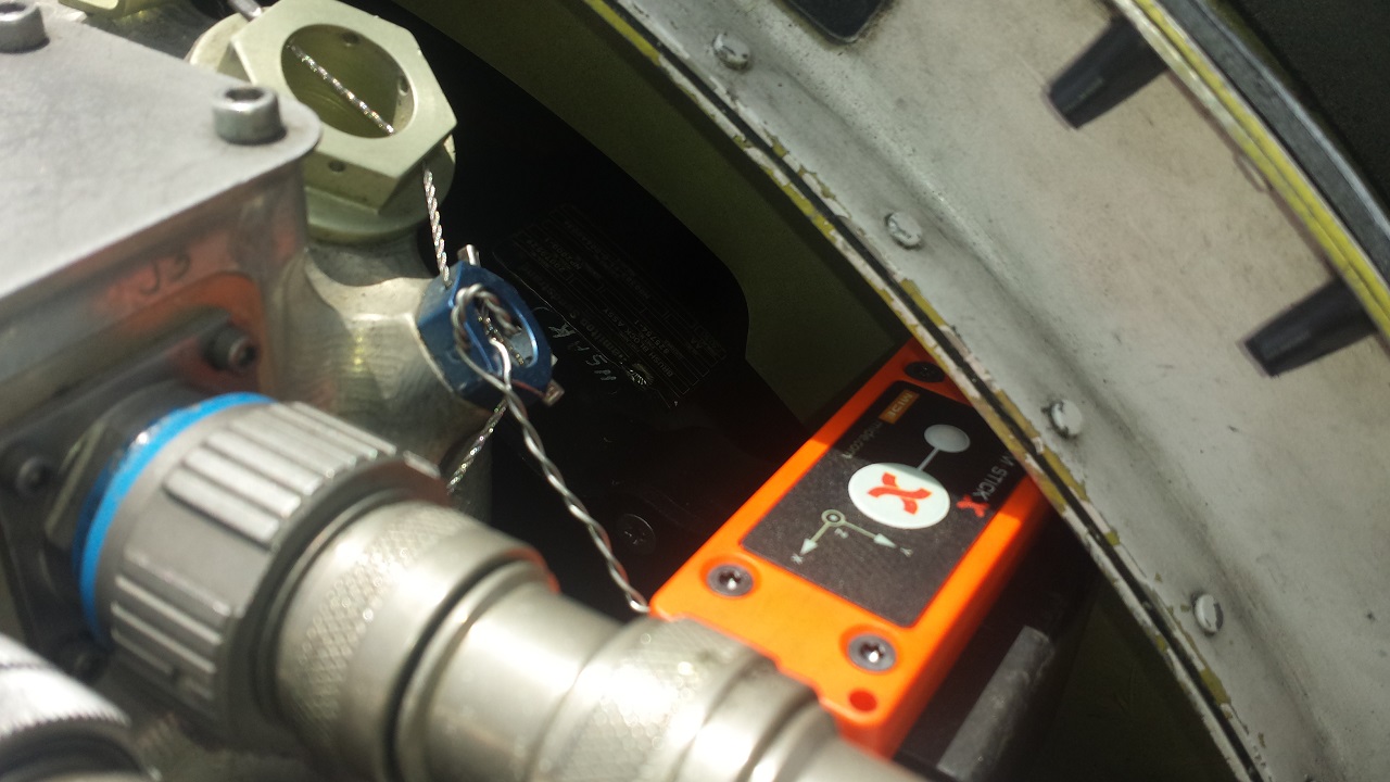 A Midé “Slam Stick-X”™ is pictured in the engine housing of a C-2 Greyhound. The device was used last year to locate and correct a vibration that prevented the aircraft's availability to the fleet. U.S. Navy photo 